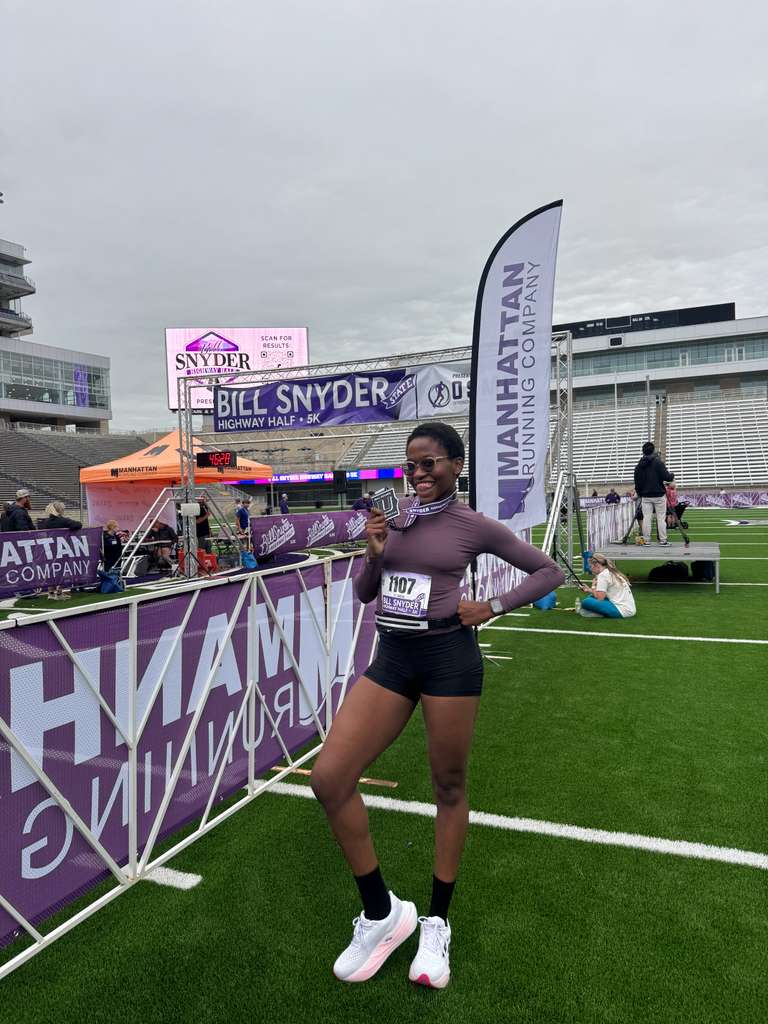 Esther with her finisher medal