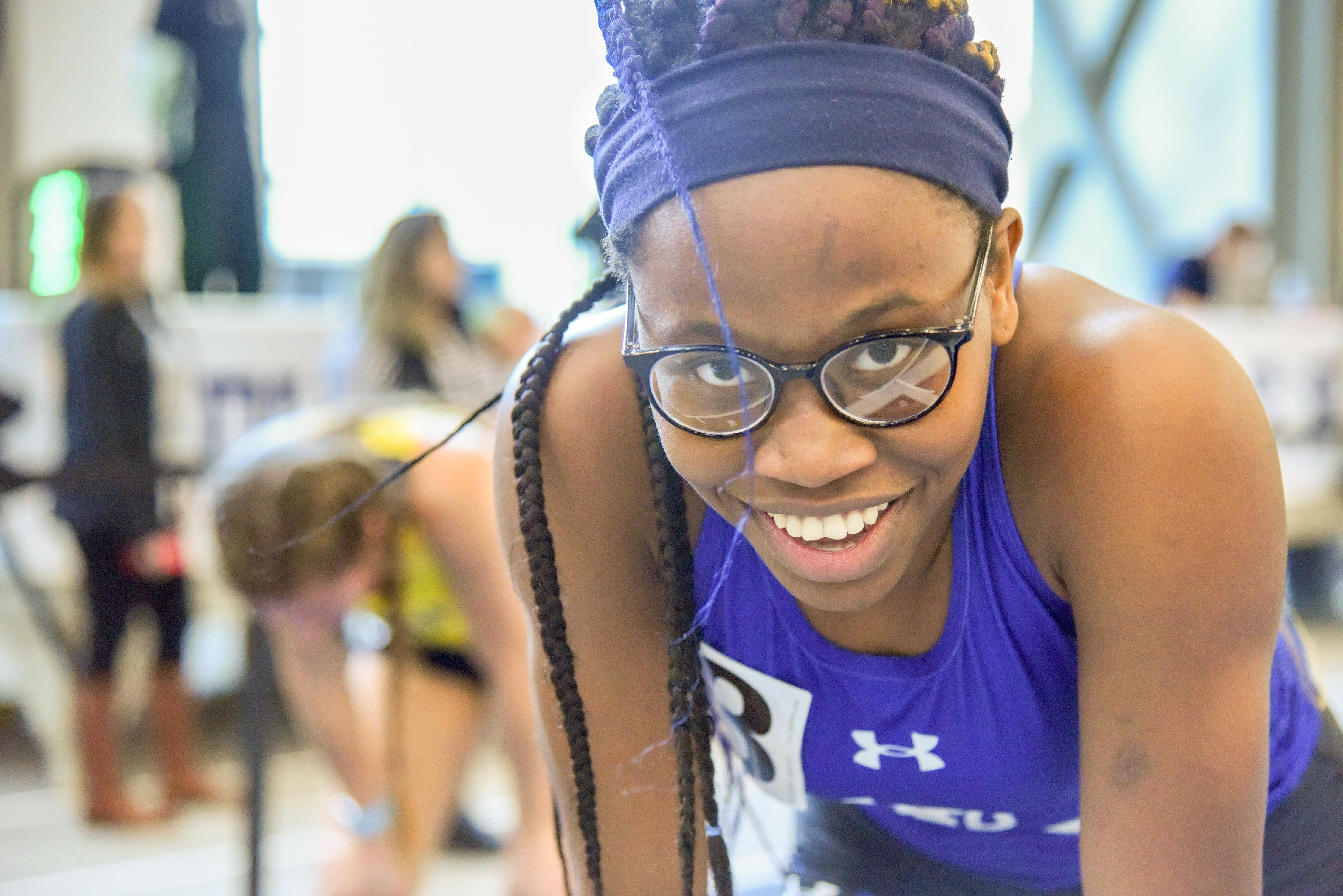 Esther on the starting line at an indoor track meet